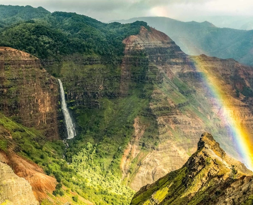 Waimea Canyon Waterfall and Rainbow Kauai shutterstock_395378092 Waimea Canyon Waterfall and Rainbow Kauai shutterstock