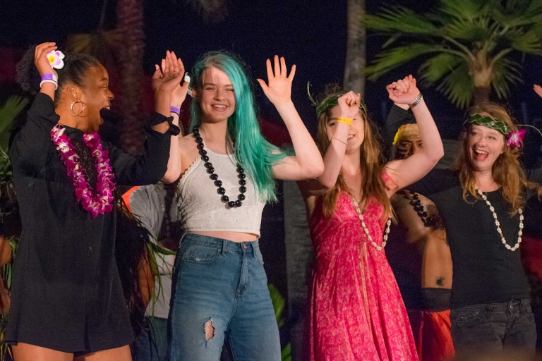 Wetnwild Vendor Chief Luau Visitor Dancing Together