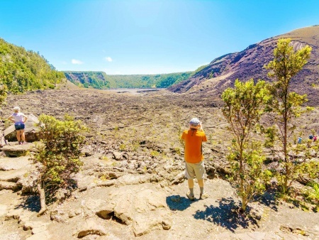 hikers in kilauea iki crater volcanoes national park big island