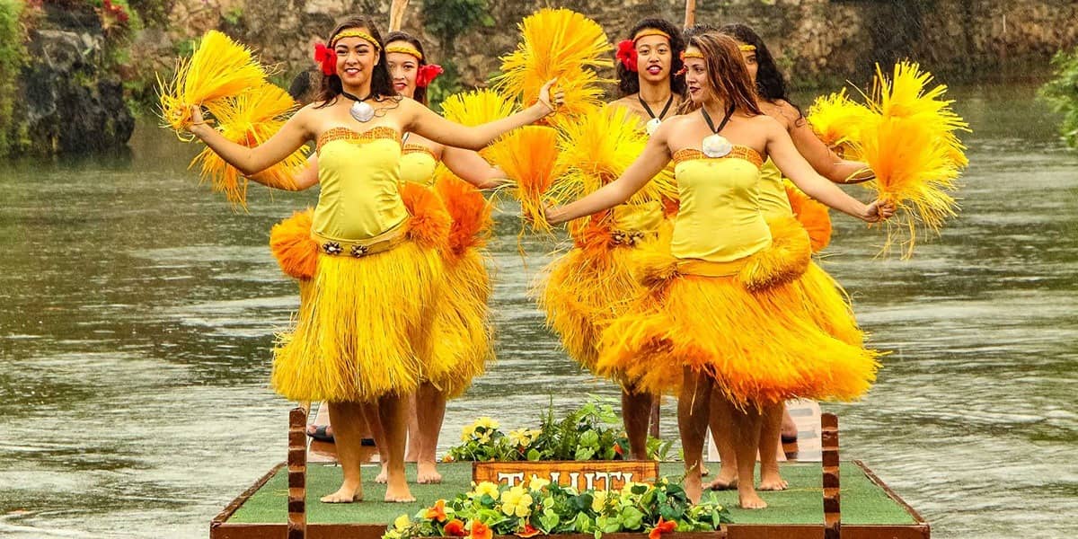 Polynesian Cultural Center Hula Dancers on Canoe