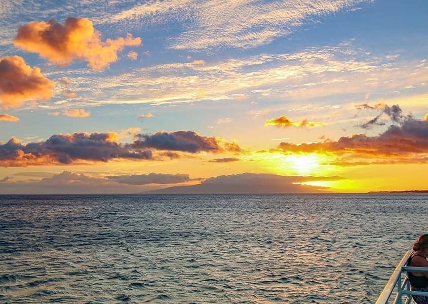 Sunset Cruise Boat Visitor and Child Maui Hawaii