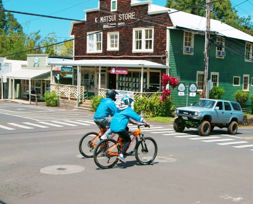 bike way down the many switchbacks through towns and villages of upcountry maui bike maui