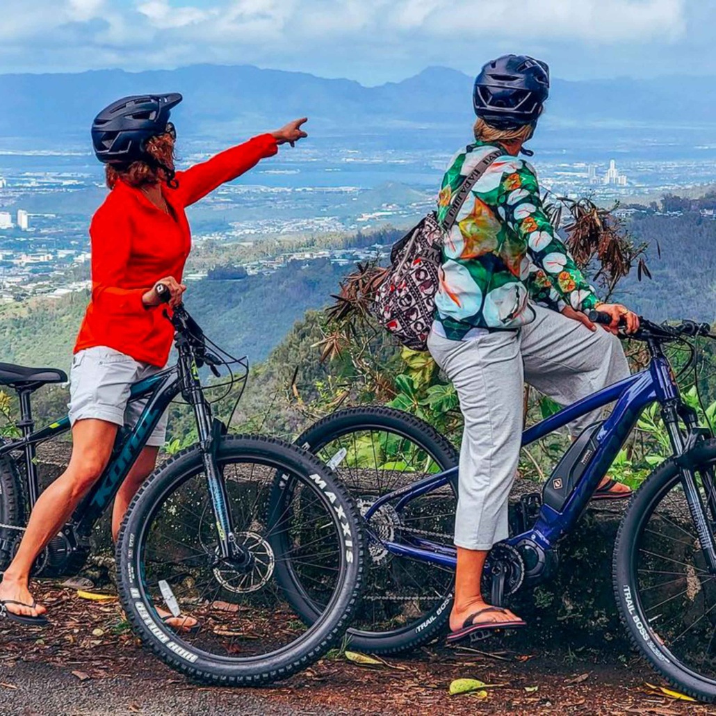 Bikehawaiitours Oahu Downhill Biking Adventure Two Women Pointing