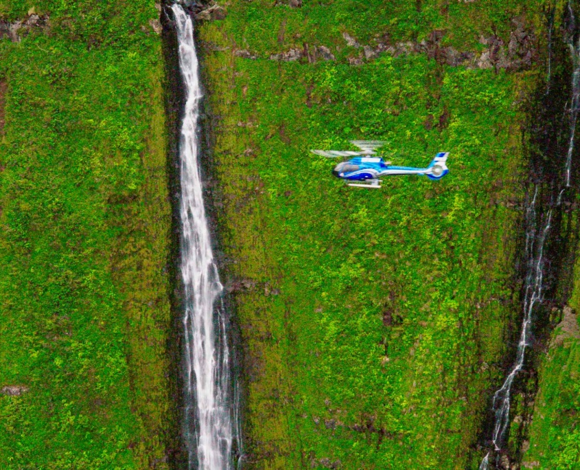 blue hawaiian complete maui helicopter tour fly over the waterfall