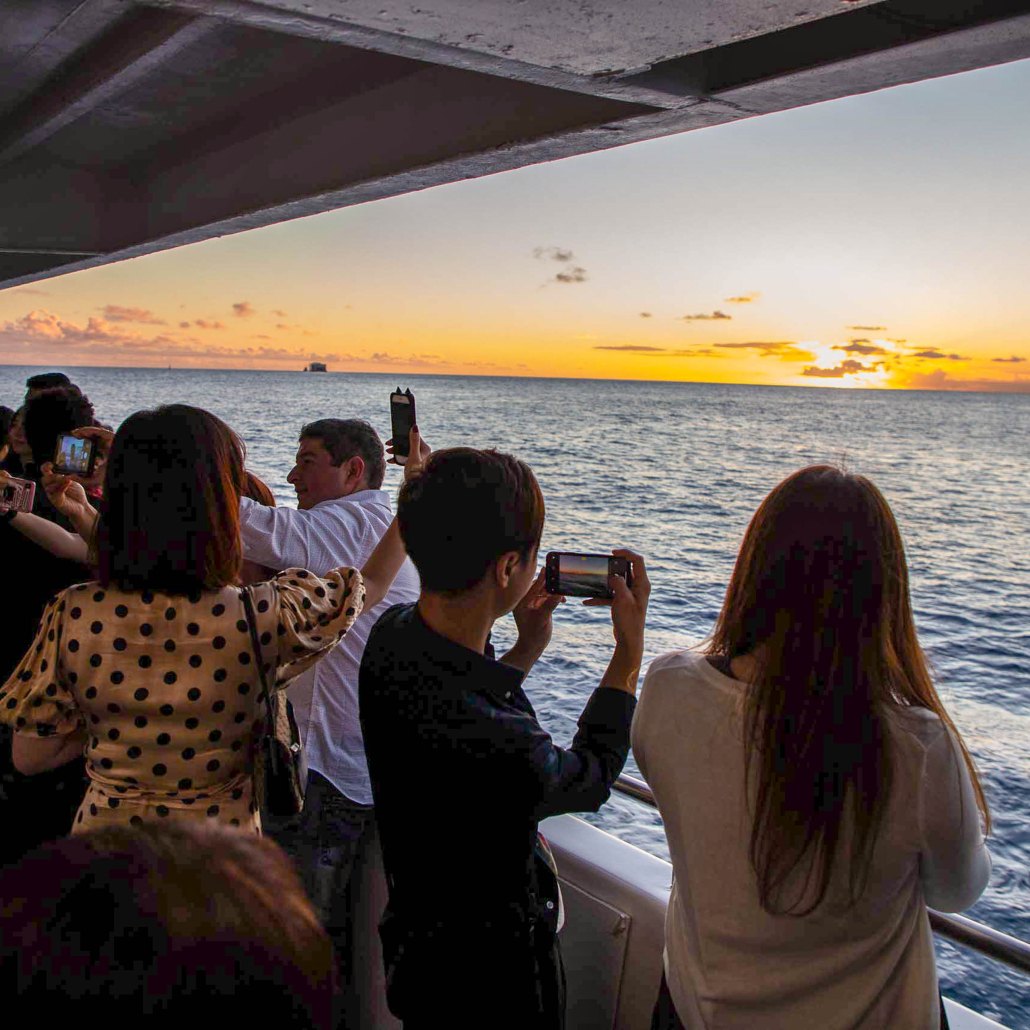 Star Of Honolulu People Taking Picture Sunset