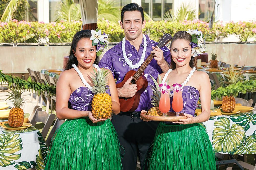 the features of the luau buffet and show package rock a hula hawaii