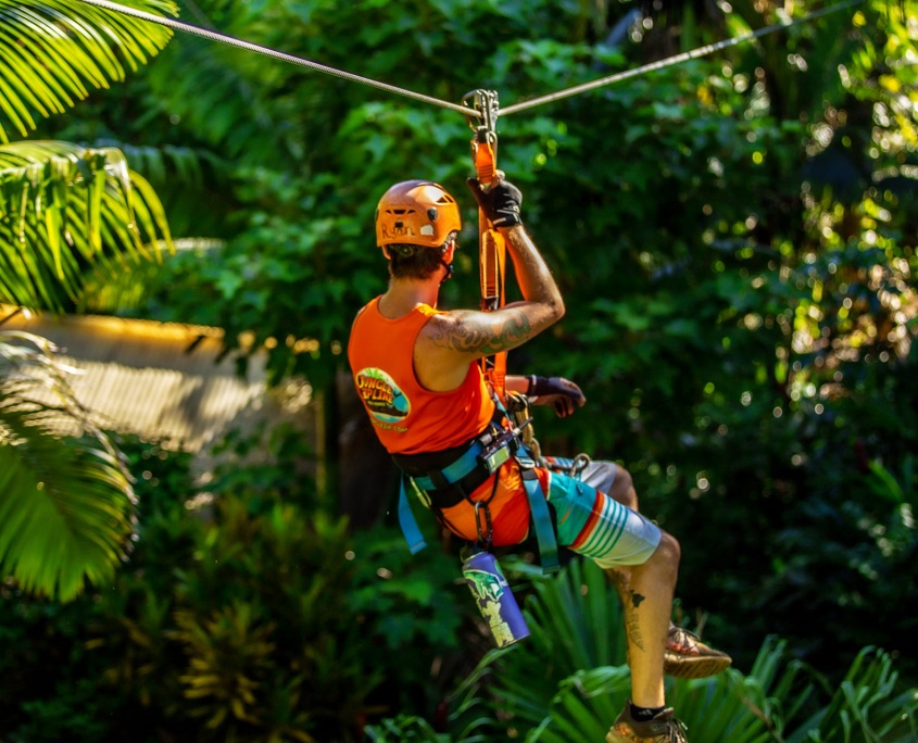 zipline over a rainforest jungle zipline maui michaelhannigIphotography