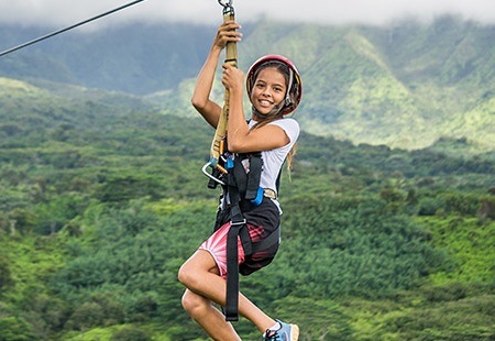 Girl Ziplining in Kauai Hawaii