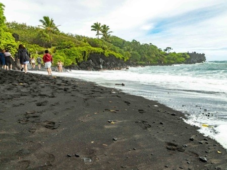 Visitors at Black Sand Beach Road to Hana Maui