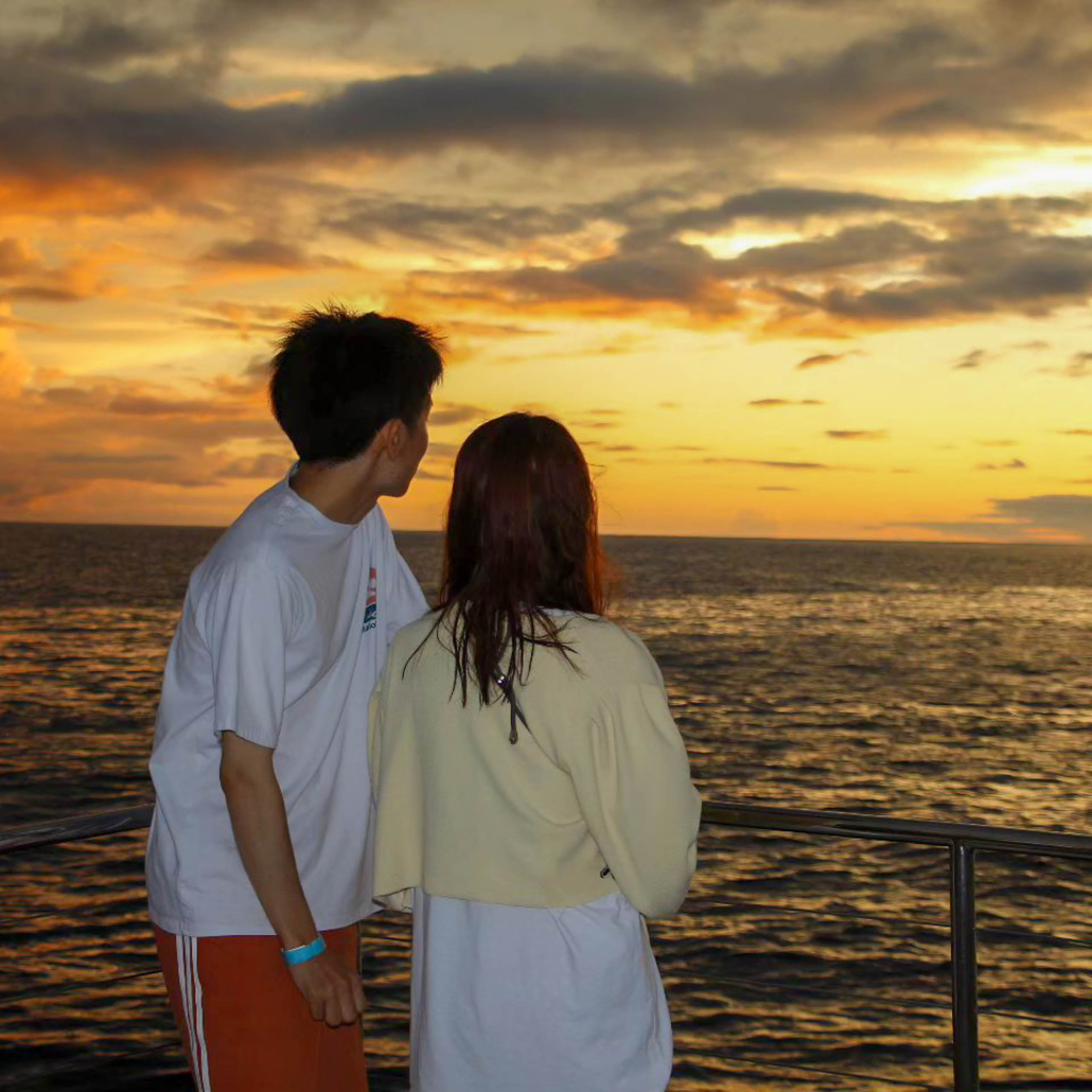 Oceanjoycruises Koolina Sunset Snorkel Cruise Couple Hugging
