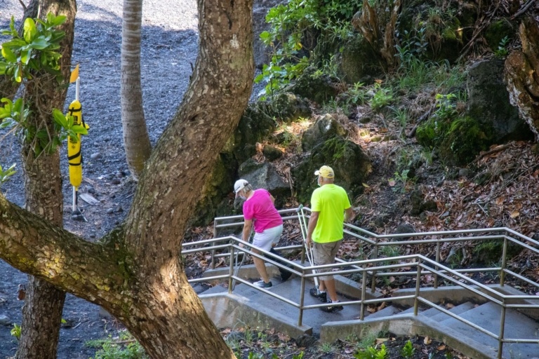 Waianapanapa Couple Going Down Stairs At Black Sand Beach
