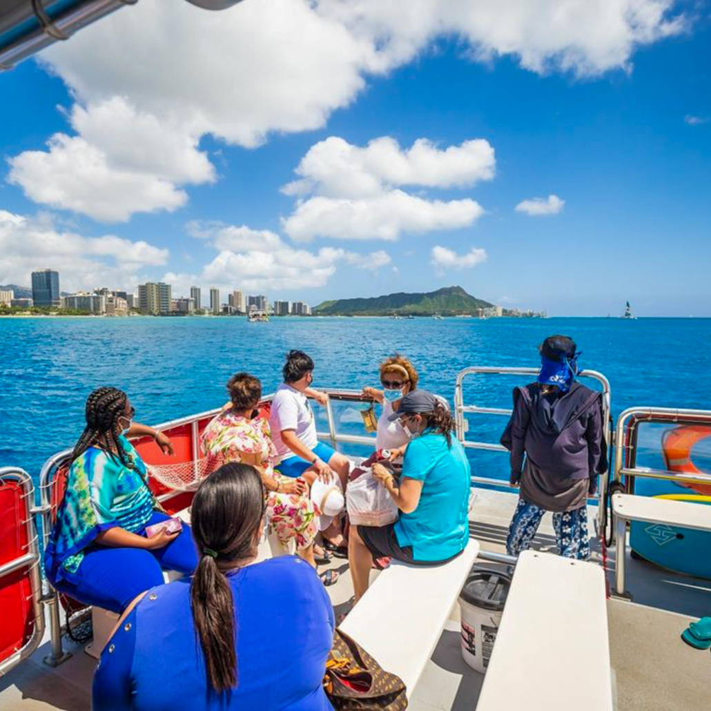 Hawaiiglassbottomboat Daytime Waikiki Boat Tour Group Of People On Board