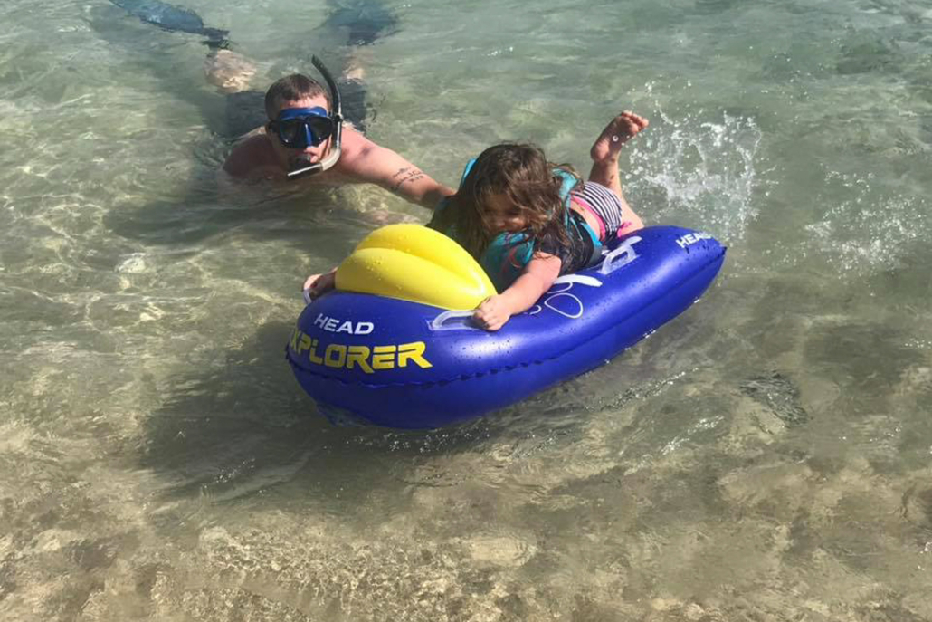 Kaimanatours Hanauma Bay Shuttle And Snorkel Gear Rental Kid Having Fun
