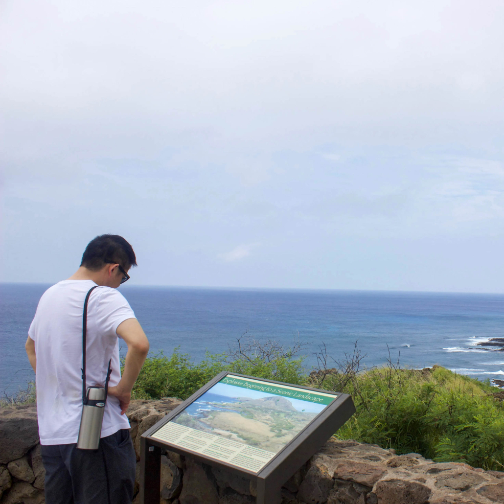 Kaimanatours Lighthouse Trail Hike A Man Read Infor Board