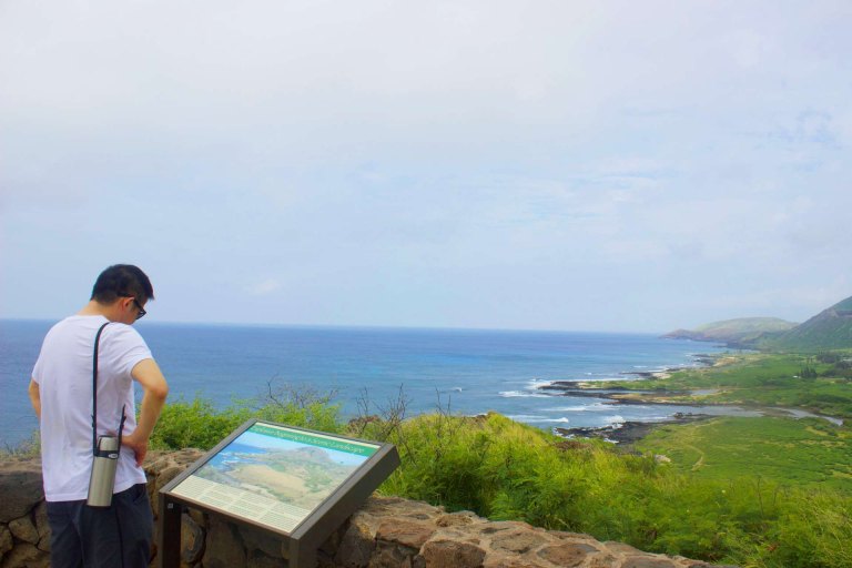 makapuu point lighthouse trail hike man read information