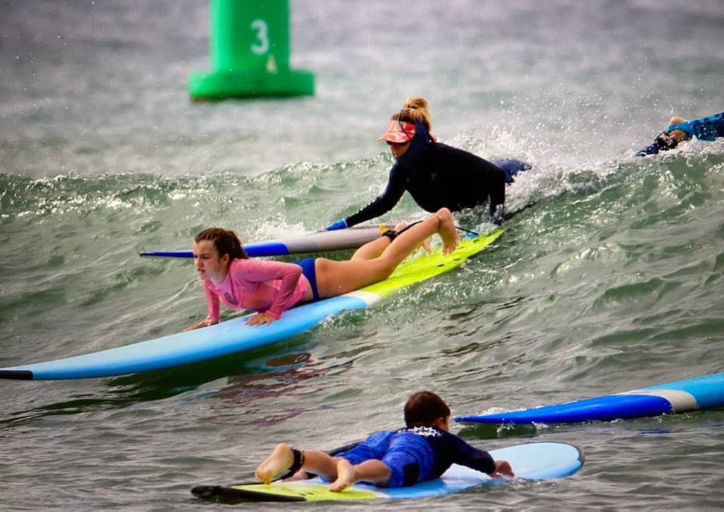 Northshoresurfgirls Group Surf Lessons In Haleiwa Slide First Wave
