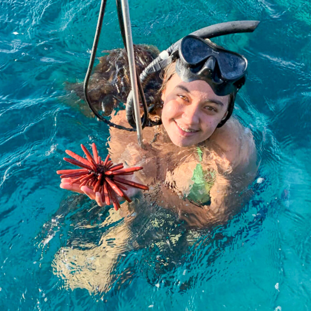 Oceanoutfittershawaii North Shore Private Raft Tour Girl And Ocean Creature