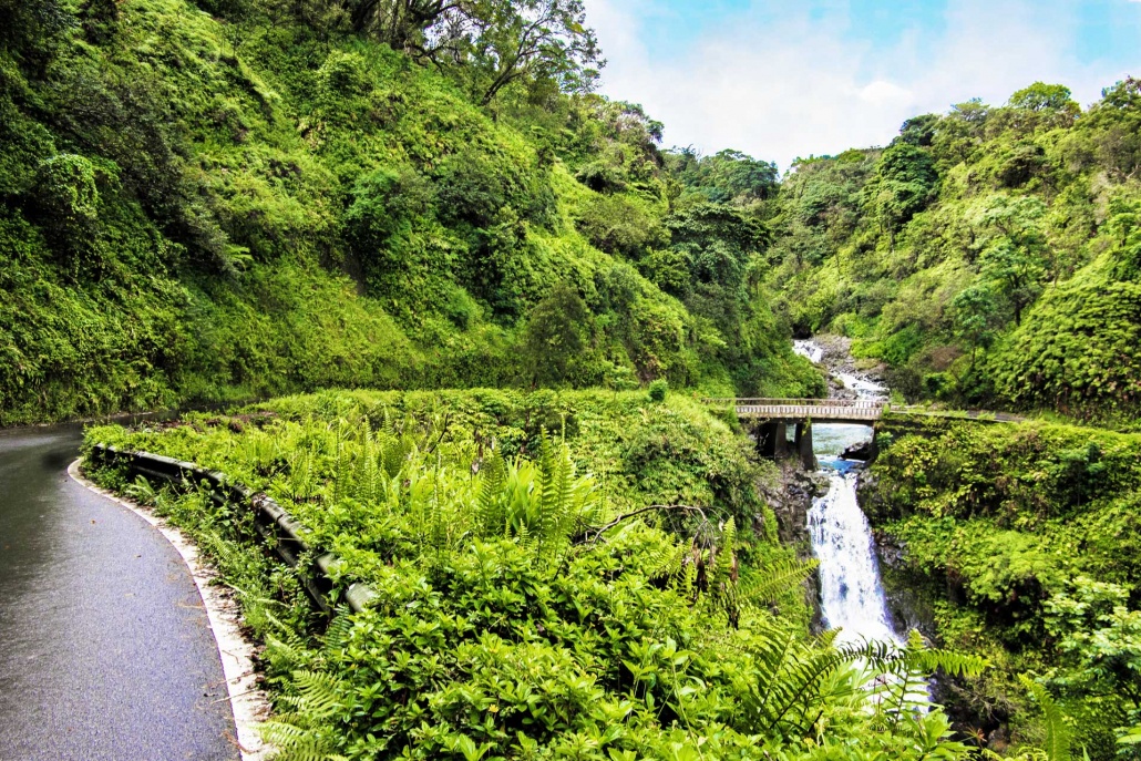 the hana highway beside a waterfall on the north coast of maui