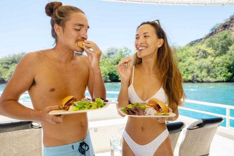 fair wind kona coast snorkel tour hula kai couple enjoying lunch