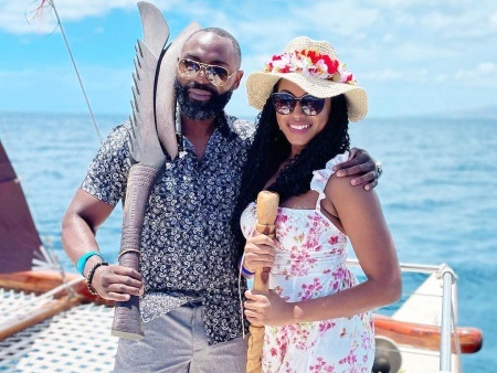 sweet couple on a traditional polynesian sailing canoe kamoauli
