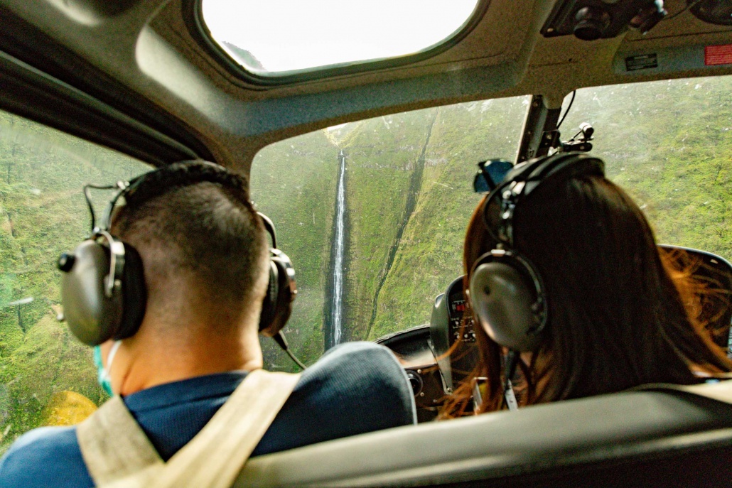 Helicopter View Passengers and Waterfall Molokai