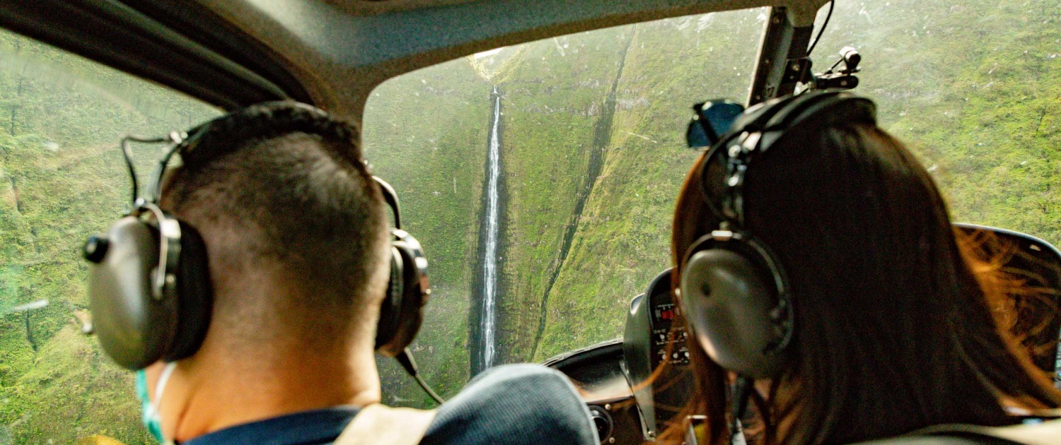 Helicopter View Passengers and Waterfall Molokai