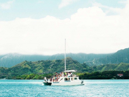 get beautiful views of the entire kualoa mountain range and enjoy a cruise through kaneohe bay