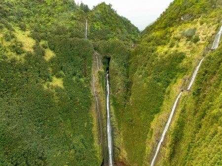 Waterfalls in the upper valleys of the Hana rainforest in east Maui