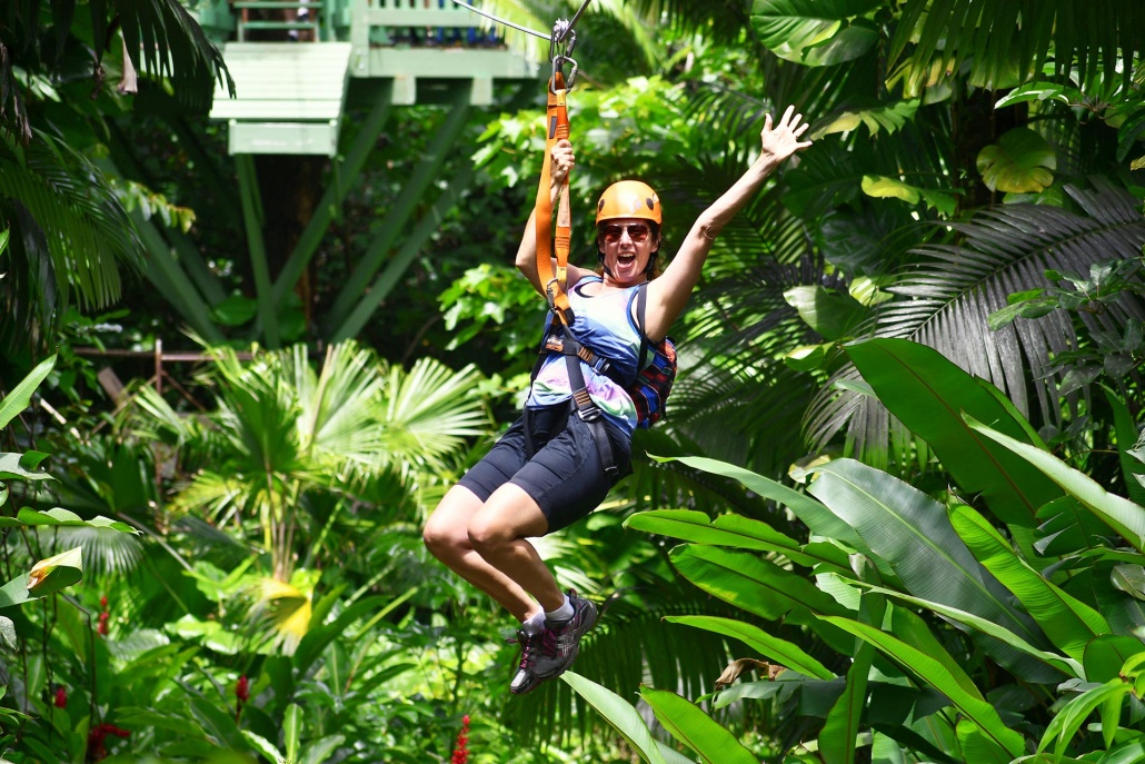 fun zipline flying through the jungle on a jungle zipline tour in maui