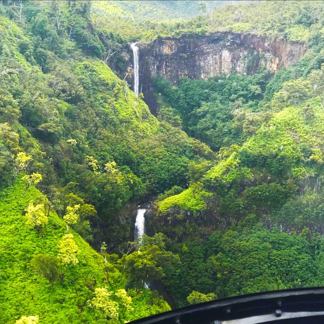 soar next to draping waterfalls kauai sunshine helicopters