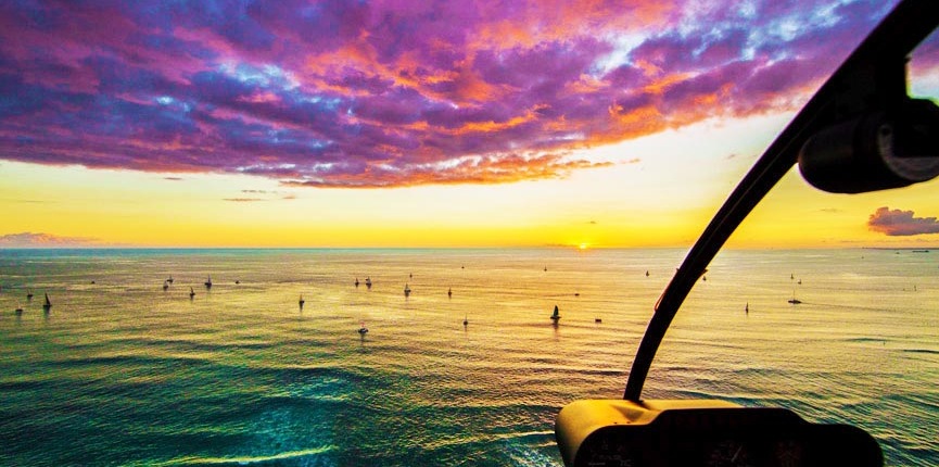 beautiful sunset cockpit view oahu beach rainbow helicopters