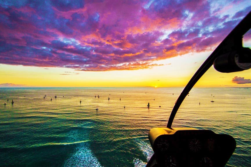beautiful sunset cockpit view oahu beach rainbow helicopters
