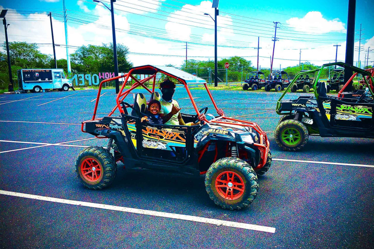 Father And Son Driving An Off Road Atv To Explore Coral Crater Feature