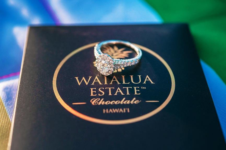 includes chocolates champagne and hawaiian flower leis in the proposal flight oahu hawaii rainbow helicopters
