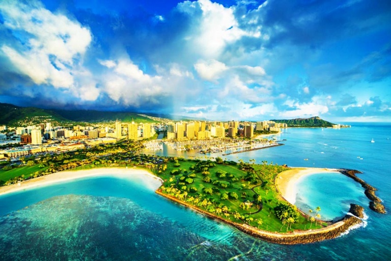 skyline of honolulu on waikiki beach oahu rainbow helicopters