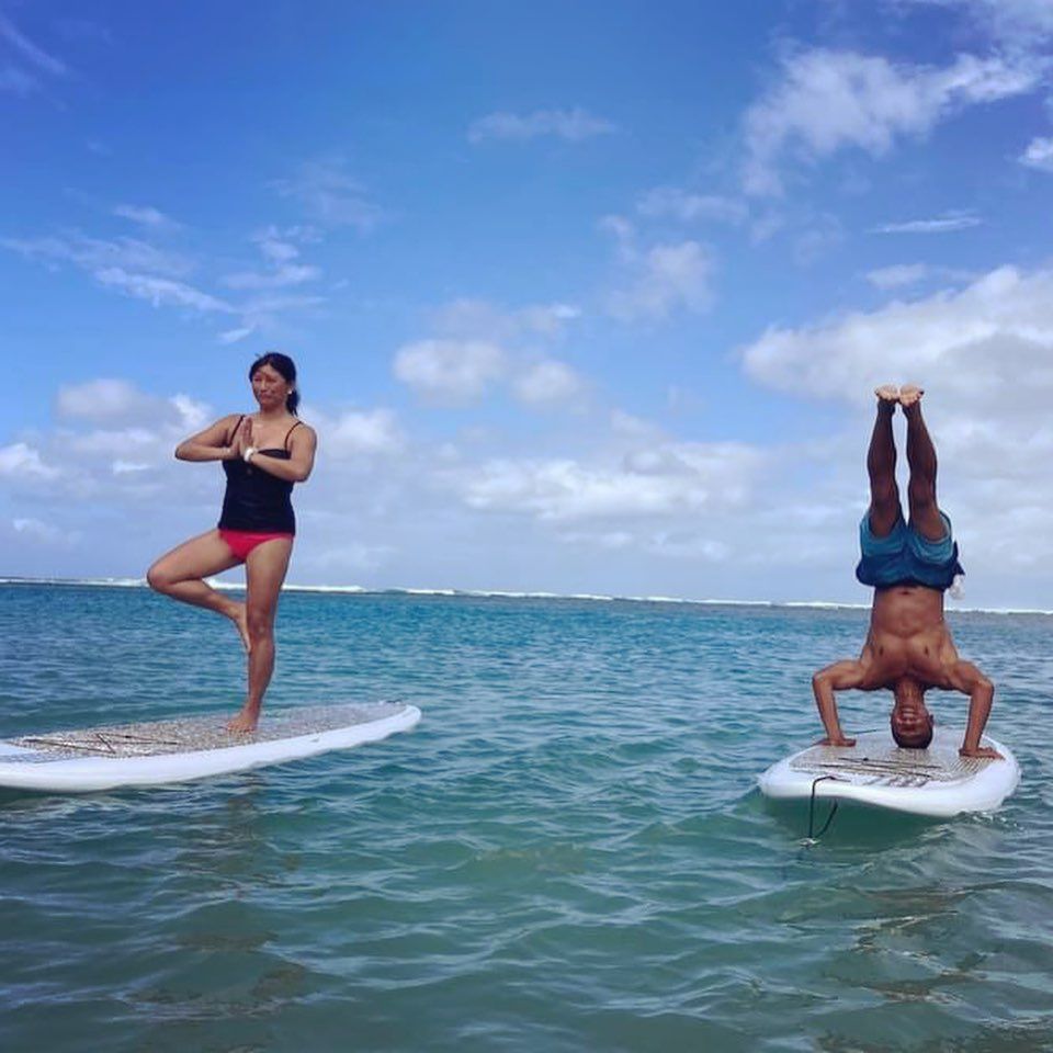 Yoga floats waikiki intro to paddling oahu ocean