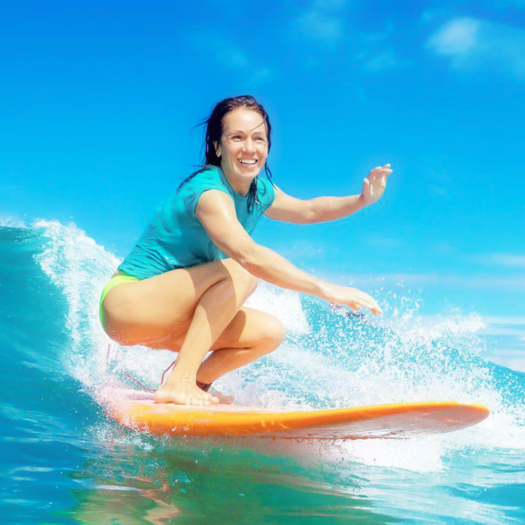 Beautiful Girl Surfing On Big Transparent Waves Maui Island  