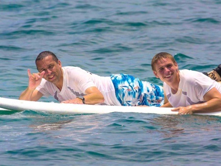 surfing is a great way to enjoy the waves and ocean hawaii lifeguard surf instructors banner