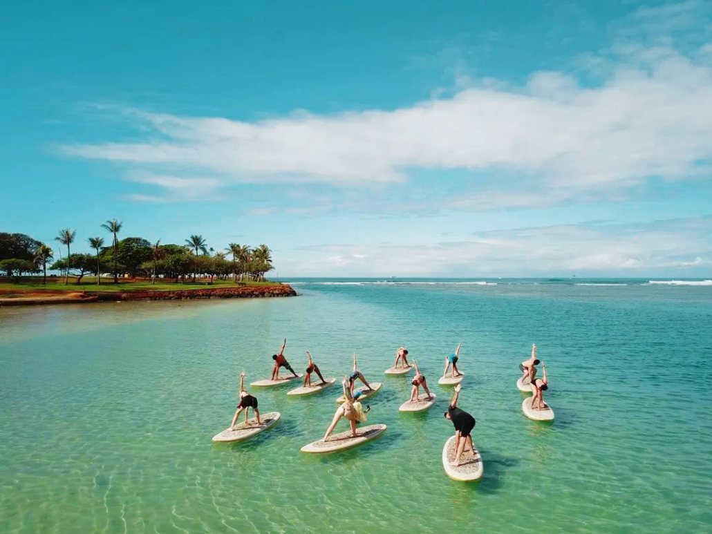 waikiki flow and go yoga fun and relaxing at the beach yoga floats