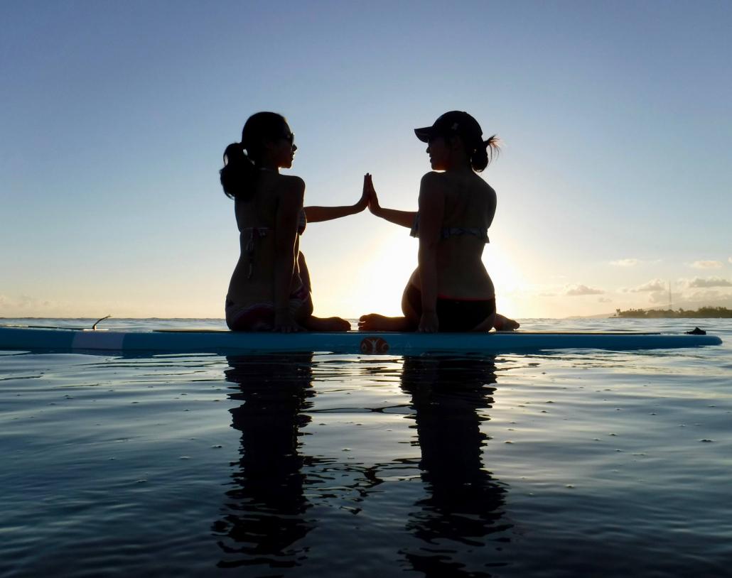 yoga floats waikiki sup lesson oahu friendship scaled