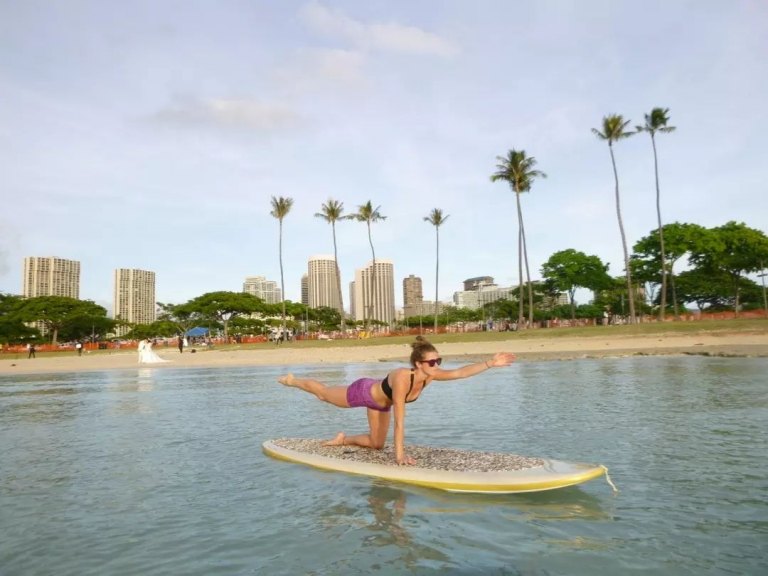 yoga floats waikiki sup lesson oahu surfing