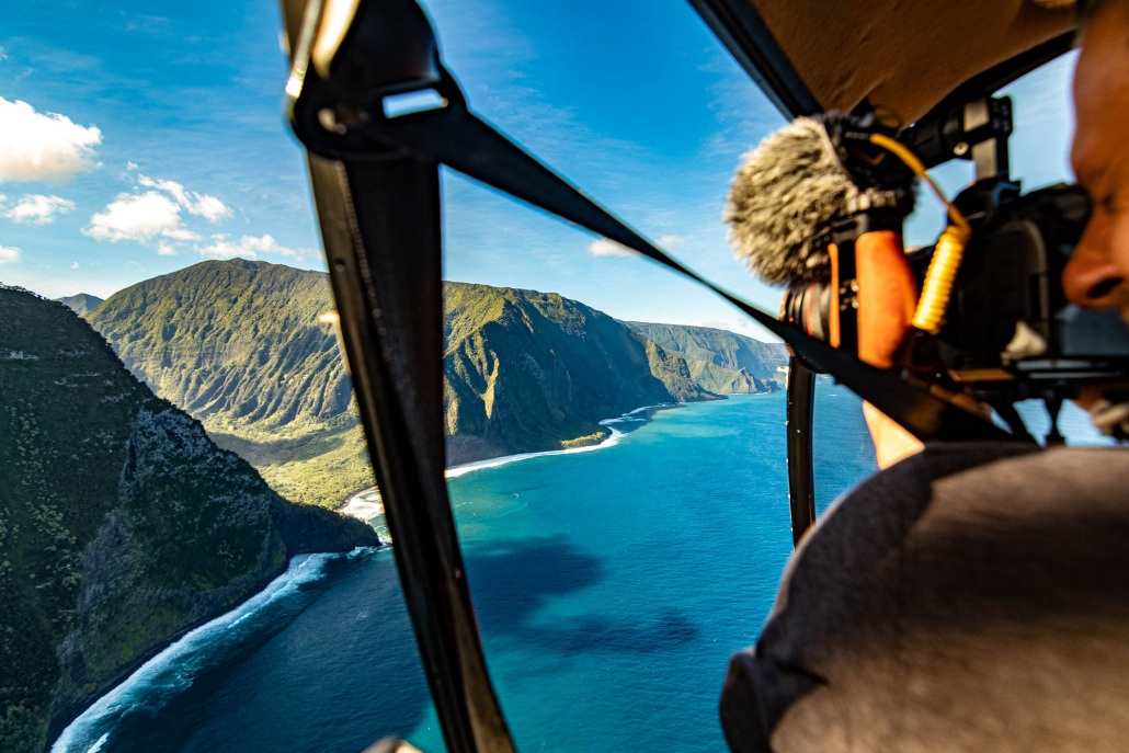helicopter tour maui molokai ocean cliffs and photographer hta
