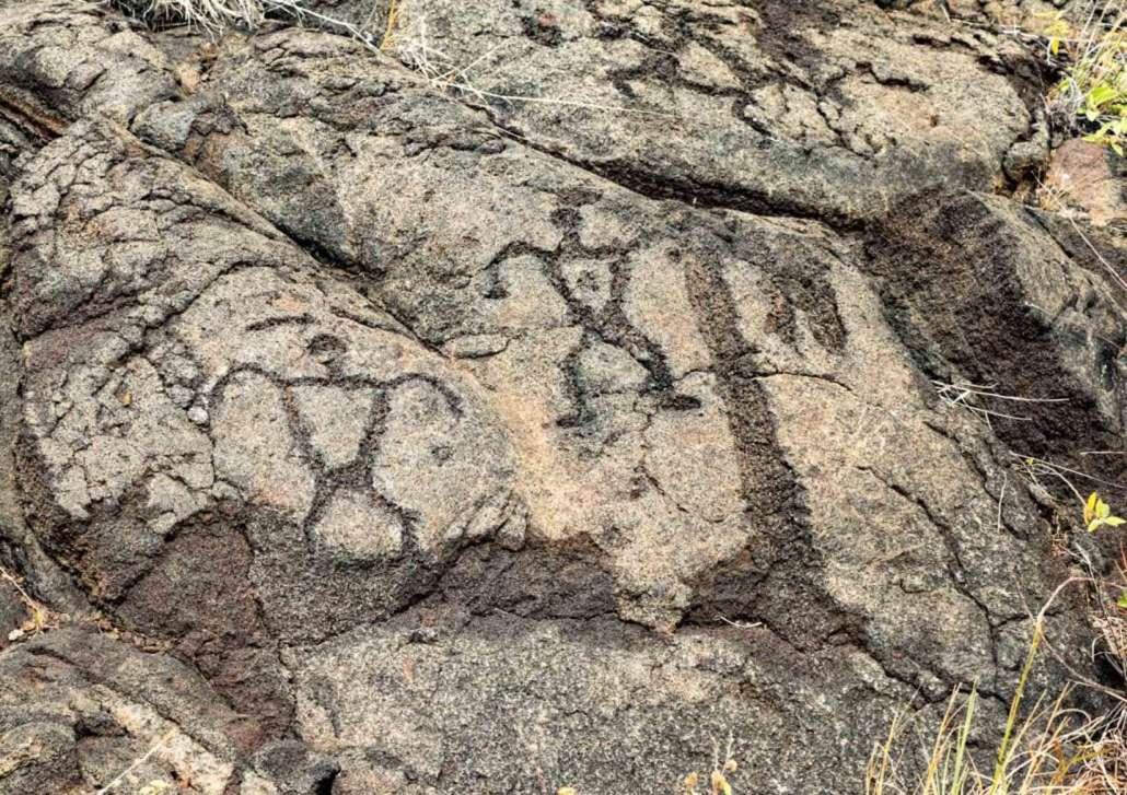 human figure petroglyphs at puuloa along chain of craters road volcanoes national park big island