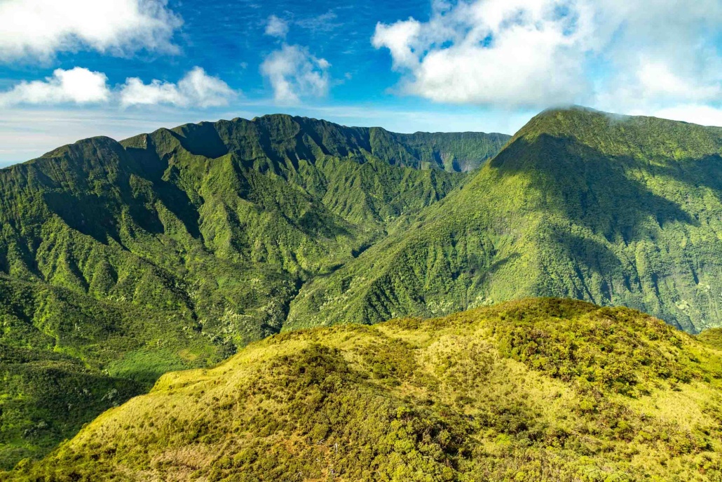 the beauty of these majestic mountains as they rise up from helicopter tour of maui and molokai mountains in hawaii