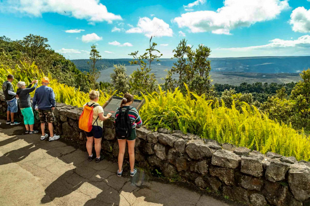 visitors at overlook of kilauea caldera volcanoes national park big island hawaii