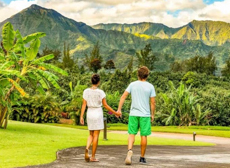 Mini Kauai Princeville Couple Visitors Walking Road