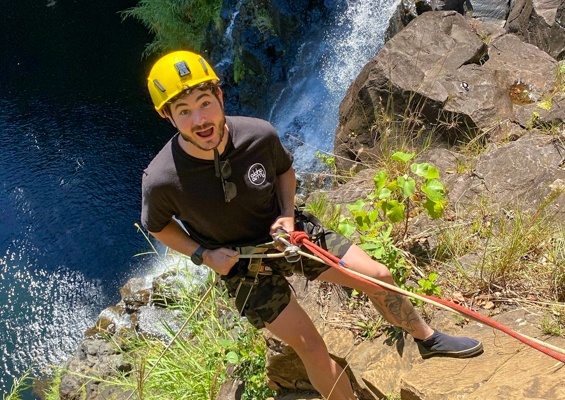 Islandmountainguides Kulaniapia Waterfall Rappeling Tour Slider Climbing Man