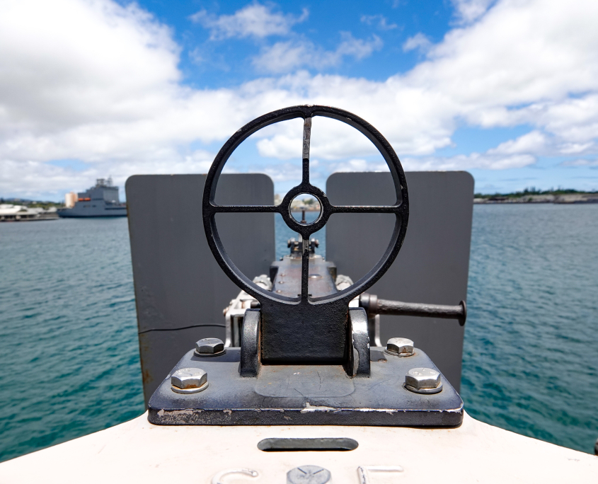View through the gun sight of a deck weapon aboard the USS Missouri battleship at Pearl Harbor