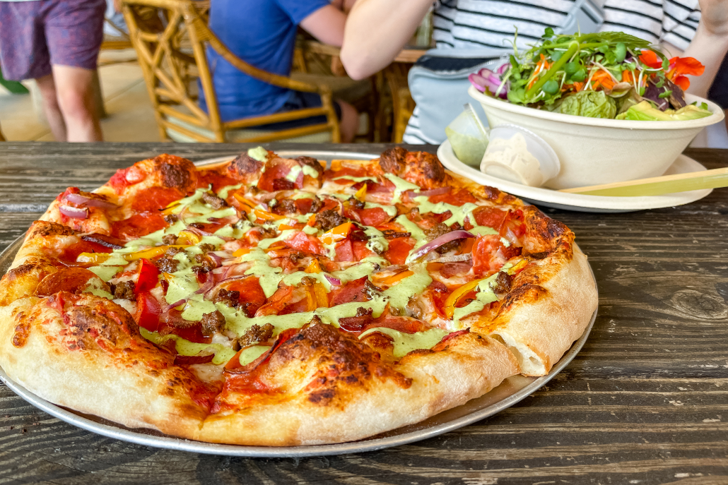 Hana Farms Food and Fruit Road to Hana Maui-7 (1) Freshly baked pizza with local toppings and a side salad at Hāna Farms along the Road to Hāna in Maui