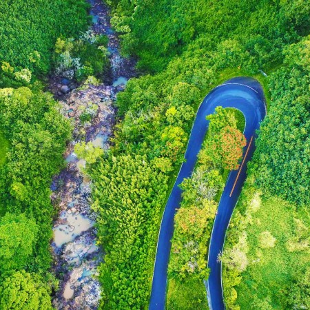 an aerial drone view of hana highway on the road to hana in maui